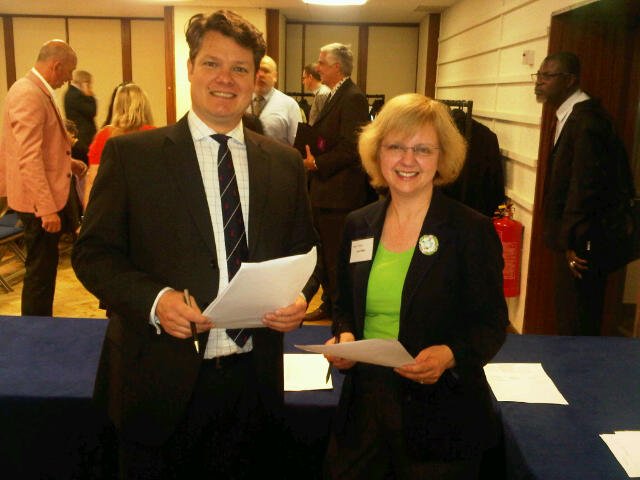 Janet and Justin meet guests at The Cinnamon Network's meeting in Methodist Central Hall, Westminster